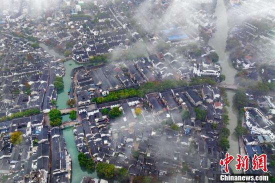 Сучжоуды? Тунли ежелг? ауылыны? тамаша т?рл?г?мен танысы?ыз