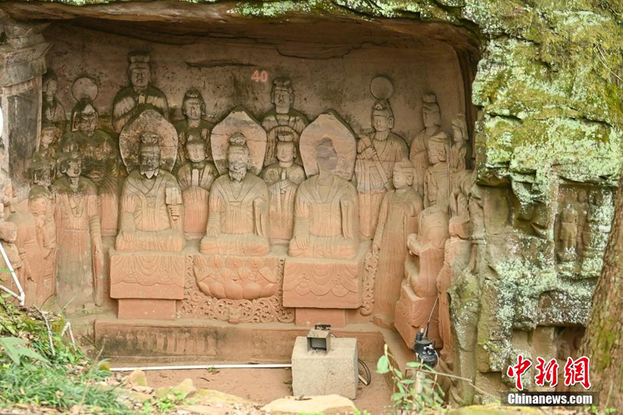 Сычуанны? Мэйшанында?ы тау арасына жасырын?ан жартас м?с?ндер